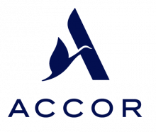 A navy blue A with an abstract bird is shown, with navy blue text that reads ACCOR in all capital letters underneath
